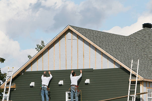 Professional Emergency Siding Repair technician working in Brecksville, OH